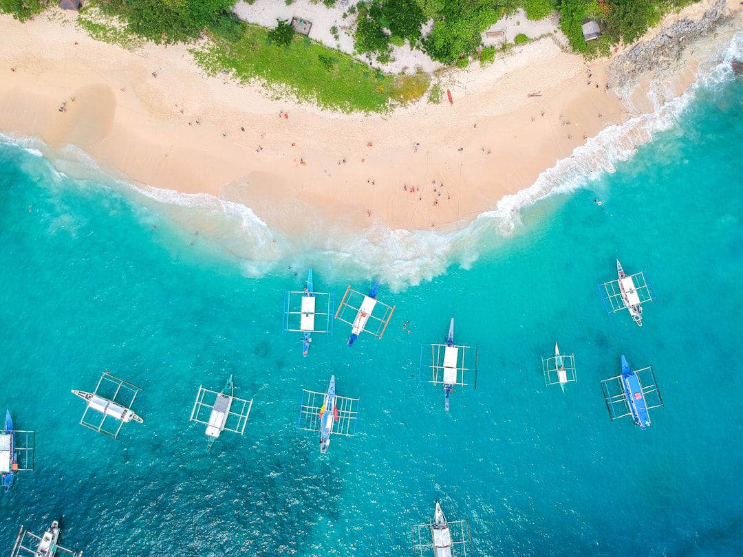 El Nido, where the Coron ferry departs Limestone karsts and calm water in El Nido's Bacuit Bay